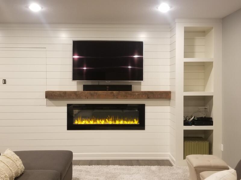 Refined wall (shiplap) versus rustic mantle (reclaimed wood). I love this look!