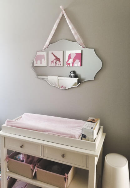 A ribbon makes this mirror extra special just like the little one who sleeps in this room.